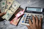 Rupiah Melemah ke Rp17.668 per Dolar AS