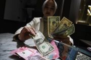 Rupiah Kembali Melemah di Angka Rp17.157 per Dolar AS