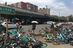 Beijing Wajibkan Helm untuk Pengguna Motor Listrik Mulai 1 Mei 2026