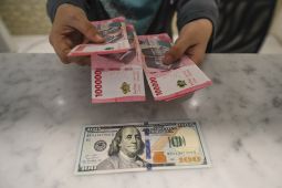 Rupiah Tergelincir usai Moody’s Revisi Outlook Indonesia
